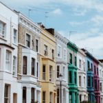 A row of brightly coloured townhouses